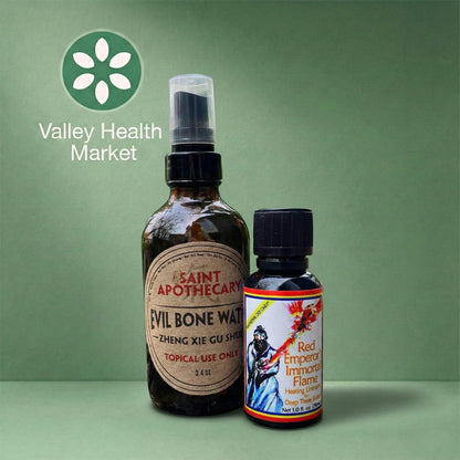 Two bottles of Saint Apothecary's Evil Bone Water and Red Emperor Immortal Flame products on a green background with Valley Health Market logo.