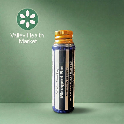 Botanical Biohacking's Microgard Plus with Valley Health Market logo on a green background