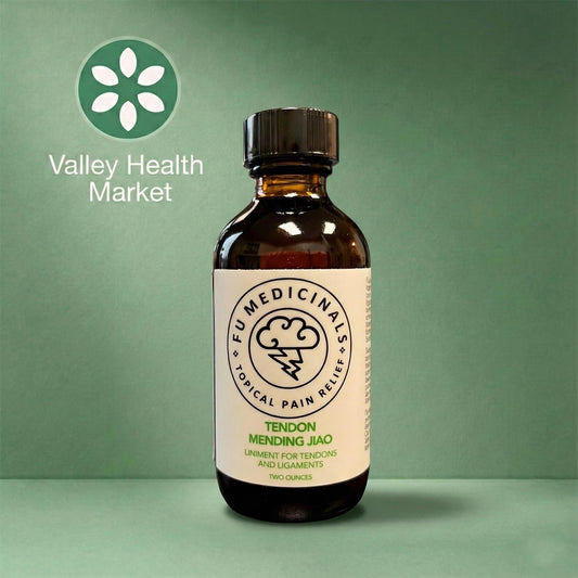 Bottle of Fu Medicinals Tendon Mending Jiao on a green background with Valley Health Market logo.